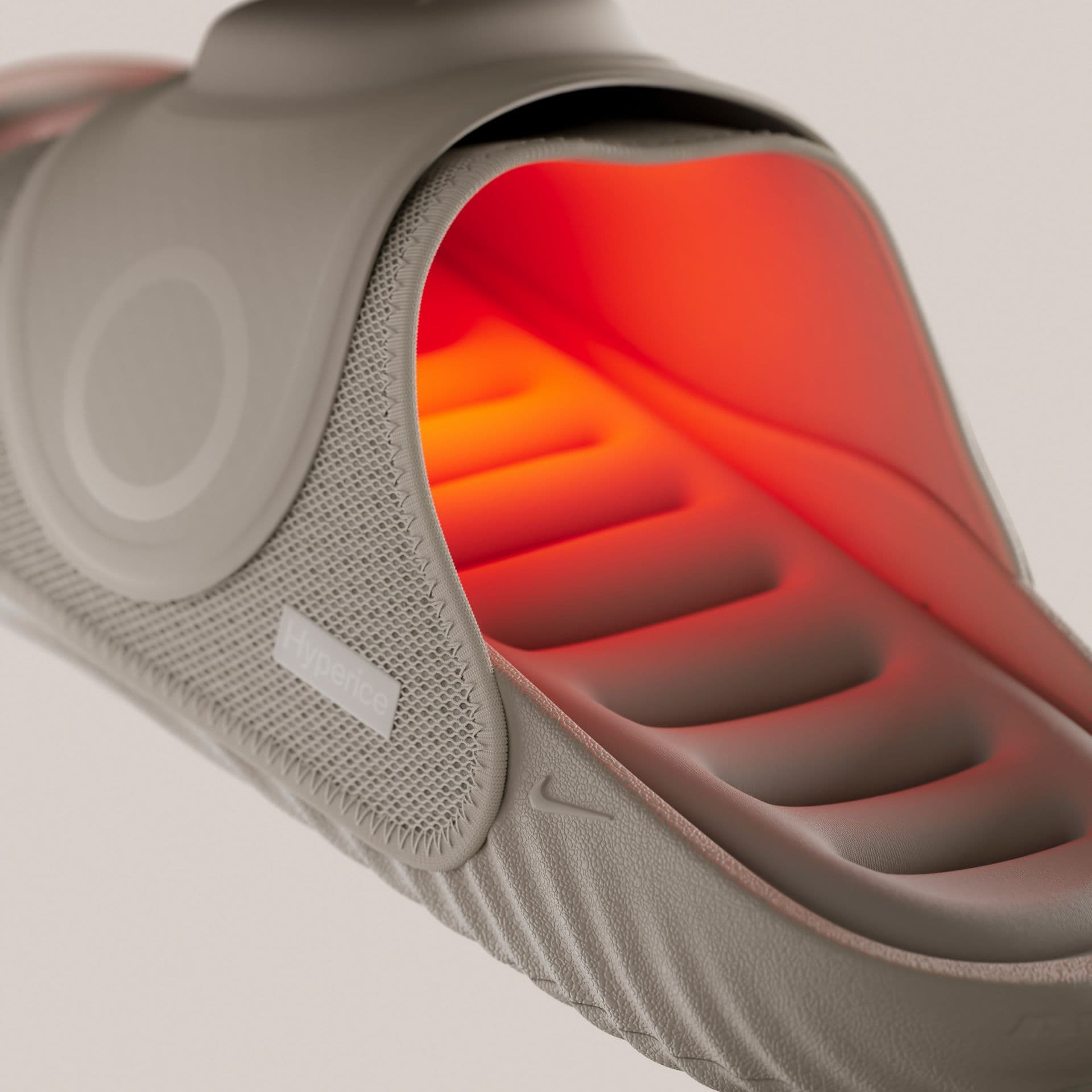 Close-up of the Nike Air Zoom Hyperslide with its footbed glowing orange from the heating element