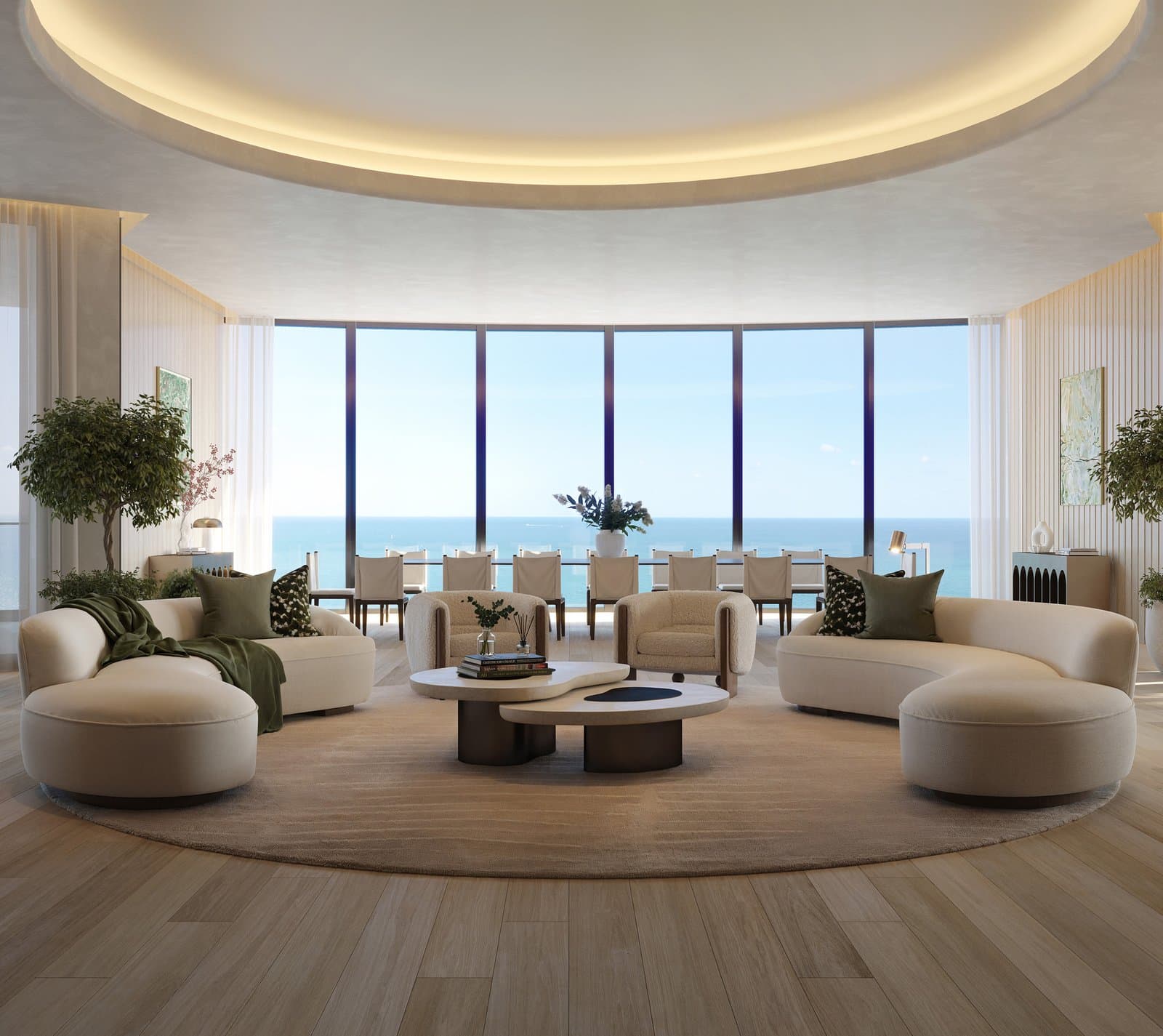 Rendering of the Ocean Penthouse great room with curved cream sofas, a domed ceiling, and floor-to-ceiling ocean views